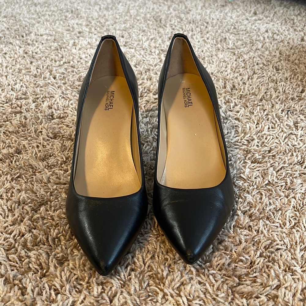 These are some black Michael kors heels used 2-3 times size 9